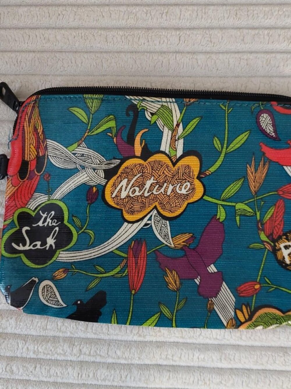 The Sak Sakroots multi coloured floral print zip blue peace bird pouch toiletry